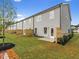 Townhome Backyard with privacy fence, grass and concrete pad at 5623 Hislop Ln # 84, Mableton, GA 30126