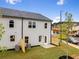 The backyard is spacious, with trees planted around the property, sectioned off with a fence from other homes at 5623 Hislop Ln # 84, Mableton, GA 30126