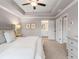 This spacious bedroom has ensuite access, neutral paint, a ceiling fan and ample natural light at 5623 Hislop Ln # 84, Mableton, GA 30126