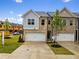 Charming townhouse with brick facade, two-car garage, and well-manicured lawn at 5623 Hislop Ln # 84, Mableton, GA 30126