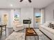 Comfortable living room with a fireplace, plush seating, and plenty of natural light at 5623 Hislop Ln # 84, Mableton, GA 30126