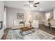 Open-concept living room with living and dining area, featuring modern decor and ample space at 5623 Hislop Ln # 84, Mableton, GA 30126