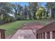 Large backyard with a combination of grass and natural areas at 6243 David Sw Ln, Mableton, GA 30126