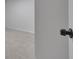 View of finished basement area with gray carpet and light-colored walls at 6243 David Sw Ln, Mableton, GA 30126