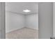 View of finished basement area with gray carpet and light-colored walls at 6243 David Sw Ln, Mableton, GA 30126