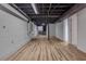 Spacious basement featuring light-colored walls and flooring, with exposed ceiling details at 6243 David Sw Ln, Mableton, GA 30126