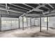 Unfinished basement featuring ductwork and utility access, neutral paint and concrete floor at 6243 David Sw Ln, Mableton, GA 30126