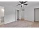 Bedroom with open closet doors and an attached bathroom at 6243 David Sw Ln, Mableton, GA 30126