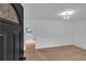 Bright foyer features beautiful flooring, modern lighting, and a glimpse into the backyard at 6243 David Sw Ln, Mableton, GA 30126