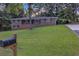 Charming brick home featuring a well-manicured lawn and a classic mailbox at 6243 David Sw Ln, Mableton, GA 30126