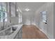 Updated kitchen featuring modern appliances, sleek floors, and ample counter space at 6243 David Sw Ln, Mableton, GA 30126