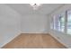 Inviting living room filled with natural light and features sleek floors and modern light fixture at 6243 David Sw Ln, Mableton, GA 30126