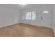 Charming living room features sleek floors, natural light, and front door entrance at 6243 David Sw Ln, Mableton, GA 30126