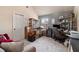 Functional home office space with carpet, storage, and a window for natural light at 817 Nevis Way, Mcdonough, GA 30253