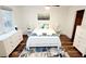 Bedroom featuring a queen bed, two dressers, and hard wood flooring at 2900 Orchard Sw Rd, Conyers, GA 30094