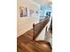 A wood staircase with railings leads to the second story of the house at 2900 Orchard Sw Rd, Conyers, GA 30094