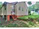 Exterior view of home featuring a spacious backyard at 304 Warren Se St, Atlanta, GA 30317