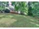 Lush backyard featuring mature trees and ample green space at 304 Warren Se St, Atlanta, GA 30317