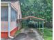 View of home showing carport alongside the driveway at 304 Warren Se St, Atlanta, GA 30317