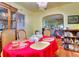 Open dining room with hardwood floors, a chandelier, and easy access to living area at 304 Warren Se St, Atlanta, GA 30317