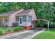 Cozy home with screened porch and attached carport, perfect for convenient parking at 304 Warren Se St, Atlanta, GA 30317