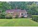 Charming single-Gathering home with a well-maintained lawn and mature trees at 304 Warren Se St, Atlanta, GA 30317