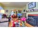 Cozy living room with a fireplace and an archway to the dining area at 304 Warren Se St, Atlanta, GA 30317