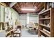 Unfinished basement with exposed ceiling and ductwork and a pegboard wall, offering great potential at 3073 Henderson Mill Rd, Atlanta, GA 30341