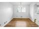 Dining room with hardwood floors, a chandelier, and natural light at 3073 Henderson Mill Rd, Atlanta, GA 30341