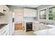 Functional kitchen with classic appliances, ample counter space, and a view of the dining room at 3073 Henderson Mill Rd, Atlanta, GA 30341