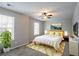 Serene bedroom featuring a comfortable bed, bright windows, and neutral decor, creating a relaxing retreat at 3870 Golfe Links Dr, Snellville, GA 30039