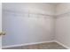 The walk-in closet with shelving units offers plenty of room for storage at 3870 Golfe Links Dr, Snellville, GA 30039