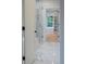 Elegant bathroom features a glass shower, marble floors and countertops for a luxurious feel at 4955 Chamblee Dunwoody Rd, Dunwoody, GA 30338