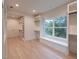 Spacious walk-in closet with natural light and built-in bench, creating a comfortable space at 4955 Chamblee Dunwoody Rd, Dunwoody, GA 30338