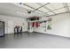 Spacious garage with epoxy flooring and ample storage, showcasing functionality and organization at 565 Rose Garden Ln, Alpharetta, GA 30009