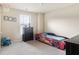 Fun bedroom with novelty race car bed and a basketball hoop at 1110 Cureton Dr, Austell, GA 30106