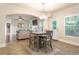 Open kitchen, with an eat-in area flowing to the living room, and natural light at 1110 Cureton Dr, Austell, GA 30106