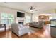 Cozy living room with fireplace, adjacent to the kitchen, perfect for Gathering gatherings at 1110 Cureton Dr, Austell, GA 30106