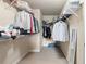 Spacious walk-in closet with built-in shelving, ample storage, and a full-length mirror at 1110 Cureton Dr, Austell, GA 30106