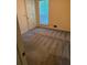 Bedroom featuring a window providing natural light, and light colored carpeting at 1481 Yates Cv, Lawrenceville, GA 30043