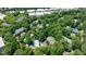 Aerial view showcases the community pool, nestled amongst lush greenery and the surrounding residential buildings at 215 Summit North Ne Dr, Atlanta, GA 30324