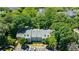 Aerial view of a residential complex surrounded by lush trees and parking at 215 Summit North Ne Dr, Atlanta, GA 30324