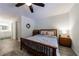 Comfortable bedroom features a ceiling fan and an ensuite bathroom at 215 Summit North Ne Dr, Atlanta, GA 30324