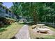 Serene community space with walking path, seating and landscaped gardens at 215 Summit North Ne Dr, Atlanta, GA 30324