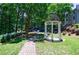 Tranquil outdoor gazebo with stone seating and lush green surroundings at 215 Summit North Ne Dr, Atlanta, GA 30324