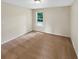 Bedroom featuring neutral colors, carpet floors, and a window with natural light at 690 Horsley Mill Rd, Carrollton, GA 30116