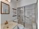 Bathroom with tiled walk in shower, marble vanity, and framed mirror at 882 Cedar Canyon Se Sq, Marietta, GA 30067