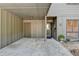 Covered carport entrance with side storage area and well-maintained landscaping at 882 Cedar Canyon Se Sq, Marietta, GA 30067