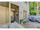 Stylish front entrance features a modern glass door and attractive landscaping at 882 Cedar Canyon Se Sq, Marietta, GA 30067