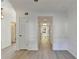 Bright hallway leading to the kitchen and other living spaces within the home at 882 Cedar Canyon Se Sq, Marietta, GA 30067